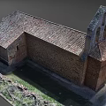 European Architecture With Red Tiled Roof Stone Walls And Arched Windows