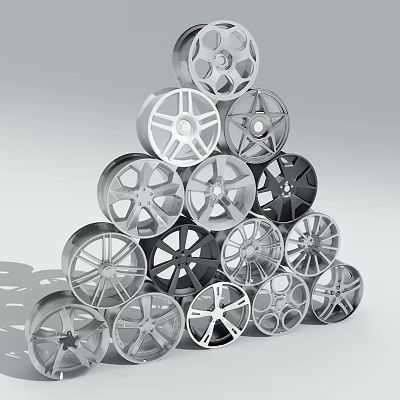 Car Tires Stacked in Pyramid Shape With Various Rim Designs Silver and Black Finish 3d model
