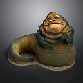 Detailed Alien Creature Sculpture With Golden Green Coloration Bulbous Body And Coiled Tail