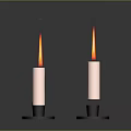 White Candles With Red Flames On Black Metal Ring Bases For Home Decor