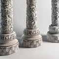 Traditional Carved Stone Pillars with Intricate Dragon Patterns in Classic Architectural Design