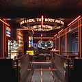 Stylish Modern Bar Interior With Neon Coffee Signs Seating Area And Ambient Lighting