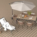 Outdoor Wicker Lounger Chair with Table Umbrella and Plants on Wooden Deck for Relaxation