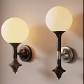 Elegant Wall Lamps With Spherical Cream Shades And Dark Brown Bases On Light Colored Wall