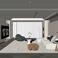 Modern Living Room Interior Design With Beige Sofa Grey Armchair Coffee Table And Knitted Pouf
