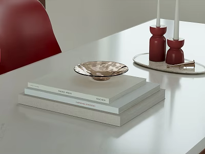 Decorative Ornament Set with Metallic Bowl Red Candle Holders and Book Stack on White Table 3d model
