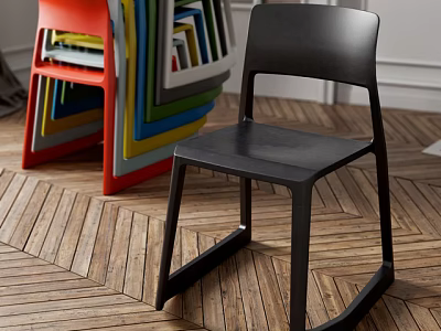Black Leisure Chair With Colorful Stacked Chairs On Wooden Herringbone Floor Interior 3d model