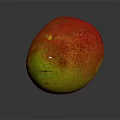 Fresh Ripe Mango with Red and Green Skin on Dark Reflective Background