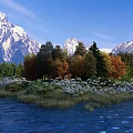 Breathtaking Mountain Lake Scenery With Blue Sky Snow Capped Peaks Colorful Trees And Grassy Shore