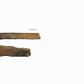 Two Natural Rockery Stones With Supporting Metal Strips On Surface For Garden Landscape