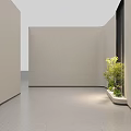 Elegant Bonsai Plants In Long Planter With Small Stones And Low Shrubs Near Light-Colored Walls