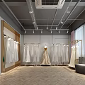 Wedding Dress Store Glass Window Display with Bridal Gowns Photography Lights and Wooden Flooring