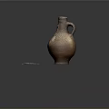 Hand Carved Ceramic Vase With Textured Surface And Decorative Handle