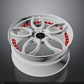 Car Wheel With White Rim And Red Accents Central Black Logo Design