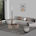 Modern Beige Sofa And Round Coffee Table Set With Throw Pillows Rug And Green Plants