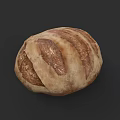 Homemade Artisan Bread With Golden Brown Crust And Scored Patterns