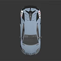 Light Blue Sports Car With Rear Spoiler Red Alloy Wheels And Sporty Design