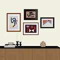 Gallery Wall Featuring Abstract Art Geometric Patterns And Frames Above Cabinet With Candlesticks And Vases 3d model