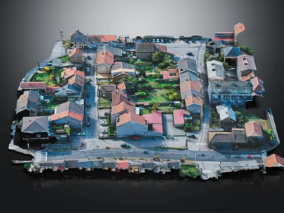 Detailed Miniature Town Model Featuring Houses Colored Roofs Green Spaces And Roads 3d model