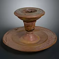 Brown Ceramic Candle Holder With Textured Carved Base And Two Tiered Structure For Home Decor