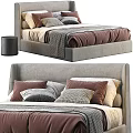 Cozy Upholstered Gray Double Bed With Brown Gray Beige Pillows And Textured Blanket