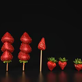 Fresh Juicy Red Strawberries Skewers And Whole Strawberries Against Black Background