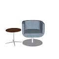 Blue Upholstered Leisure Chair With Round Metal Base And Wooden Side Table On Marble Floor