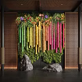 Vibrant Indoor Landscape Design With Colorful Bamboo Hanging Flowers Moss Wall And Decorative Stones