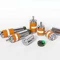Multiple Industrial Motors With Orange Silver Housing Various Sizes And Mechanical Components