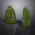Two Natural Stone Rocks Covered With Green Moss And Textured Surfaces
