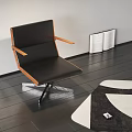 Black Leisure Chair with Wooden Armrests and Metal Legs on Dark Floor with Open Book