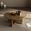 Round Wooden Coffee Table With Woven Detail Oranges Jar Brown Bag Open Book on Carpet