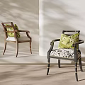 Modern Leisure Chairs With Green Patterned Cushions And Contrasting Frames In Light Room