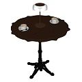 Elegant Wooden Round Dining Table With Carved Edge Black Legs Coffee Cups And Table Lamp