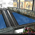 Modern Escalator In Shopping Mall Featuring Glass Railing And Surrounding Retail Shops