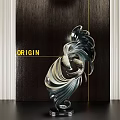 Sleek Metallic Abstract Sculpture With Curved Design And Dark Wooden Backdrop