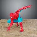 Spider Man Superhero In Red And Blue Costume Striking Dynamic Pose On Stone Floor
