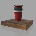 Red Cup With Black Gray Stripes Stacked On Wooden Tray