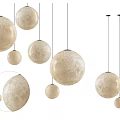 Cream Colored Moonlike Surface Spherical Pendant Lights with Multiple Sizes Hanging in Modern Design 3d model
