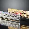 RAM Modules Featuring Silver Purple Gold Red Accents Diamond Cut Design On Black Reflective Surface
