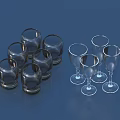 Transparent Glassware Grouped As Short Tumblers And Tall Wine Glasses On Dark Blue Background