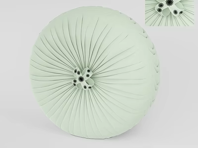 Light Green Round Decorative Item With Radial Pleated Texture And Black Center Dots 3d model