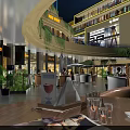 Illuminated Commercial Street with Multi storey Buildings Shops Dining Areas and Green Plants Evening Atmosphere