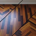 Wooden Floor Components With Herringbone And Straight Plank Patterns And Natural Wood Tones