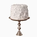Three Beautiful Cakes With Unique Textured Frostings On Silver Stands
