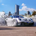 White Porsche Car Drifting with Smoke Around Traffic Cones in Urban Skyline