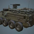 Military Wheeled Tank With Top Mounted Weaponry And Olive Green Exterior