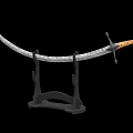 Various Traditional Swords as Weapons on Display Stands with Different Handle Designs and Sharp Blades