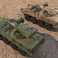 Two Tan And Green Armored Tanks On Sandy Terrain Under Blue Sky White Clouds