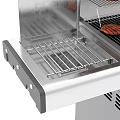 Stainless Steel Outdoor Grill Station With Wheels Storage Cabinets And Food Bottles On Countertop